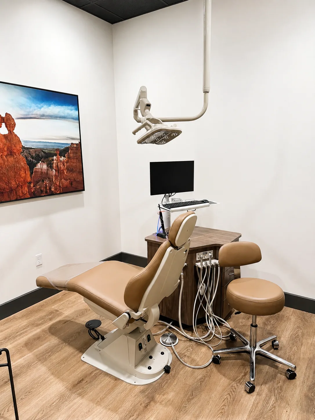 Single Call Orthodontics treatment room with workstation and integrated dental equipment